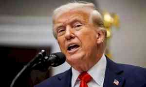 Trump signs AI order to curb state rules, warns China race at stake