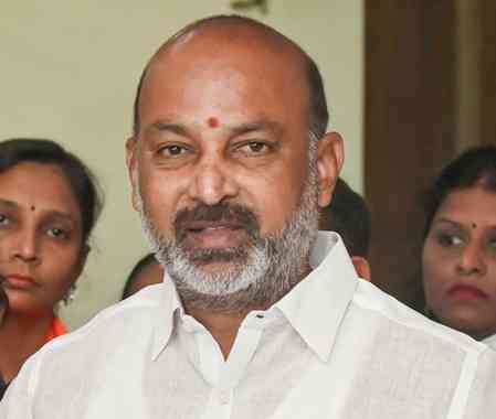 MoS Bandi Sanjay dares Owaisi to make burqa-clad woman AIMIM president