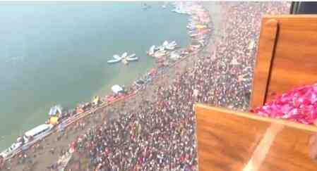 Flower petals showered on devotees at Triveni Sangam, as thousands take holy dip on Mauni Amavasya