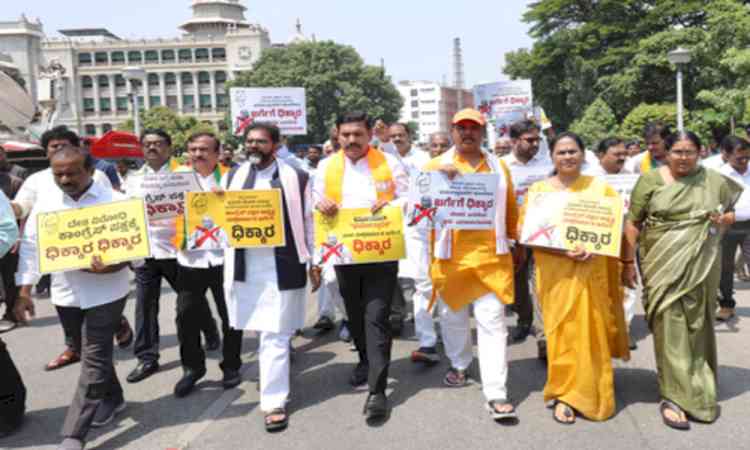 K'taka BJP protests Kharge's 'terrorist' remark on PM; demands apology