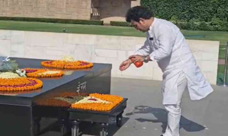 BJP leader Ravinder Singh Negi 'purifies' Rajghat after Kejriwal, Sisodia's visit