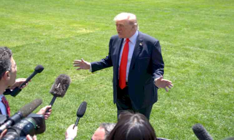 Trump reviews Iran deal, hints troop cuts