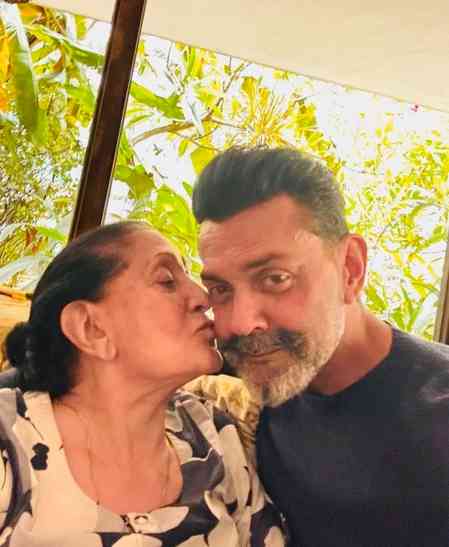 Sunny Deol captures a lovely moment of brother Bobby getting showered with love by their mom