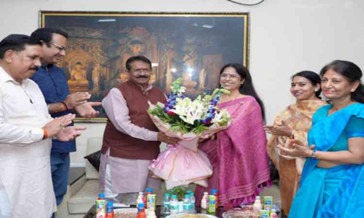 Delhi BJP chief gives booklet on PM Modi’s govt to Rajguru College principal