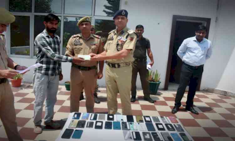 Police in J&K’s Poonch return 50 recovered mobile phones to owners