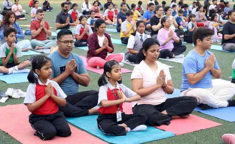 Strengthening Bonds Through Yoga: Parent-child duos Celebrate International Yoga Day at Greenwood High