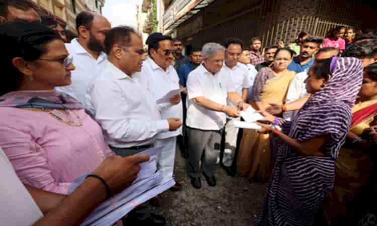 Union Minister CR Paatil distributes flood relief assistance to affected families in Surat