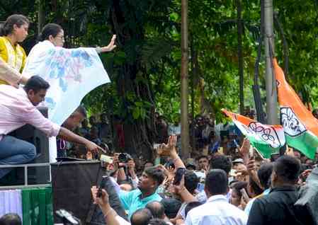 Mamata Banerjee rides scooter to reach protest site after Trinamool leaders detention 