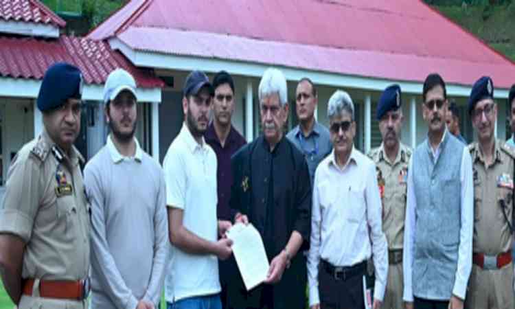 J&K L-G hands appointment letters to families of martyred policemen