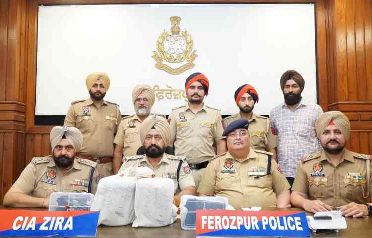 Drug smuggler held with 3.54 kg heroin; Firearms found during house raid