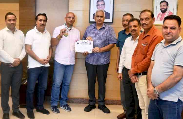 MDU’s Golden Double in Nepal: Staffers Storm to Gold in Discus Throw and 200m