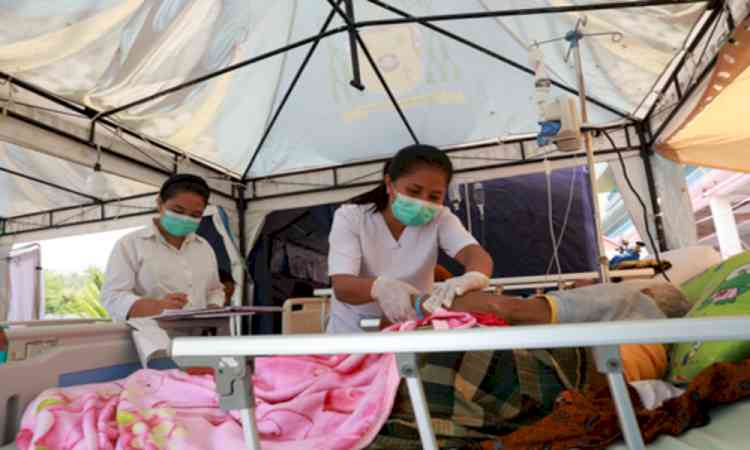 Indonesia quake death toll rises to 100 as thousands remain displaced