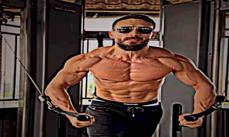 Tiger Shroff hits the gym for iron therapy: No better feeling than moving big dumbells 