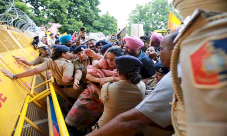 Akali Dal activists seek bribery case registration against Punjab CM's wife 