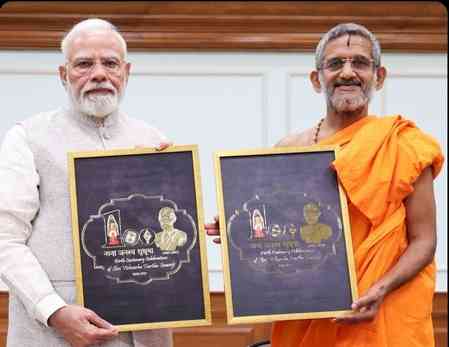 PM Modi unveils logo for birth centenary celebrations of Pejawar Math's Sri Vishwesha Tirtha Swamiji