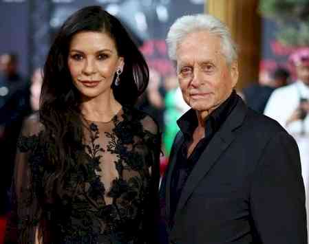 Michael Douglas says he had never fallen in love on movie screen until he saw his wife Catherine 