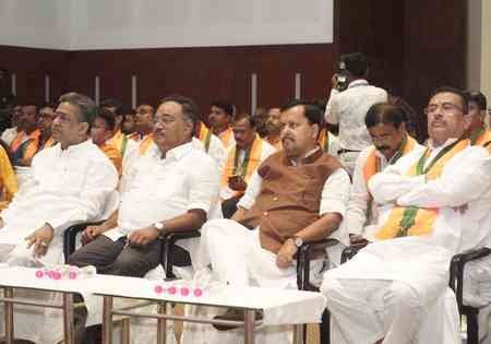 Nitin Nabin listens to ‘Mann Ki Baat’ with party workers at Biswa Bangla Convention Centre in Bengal
